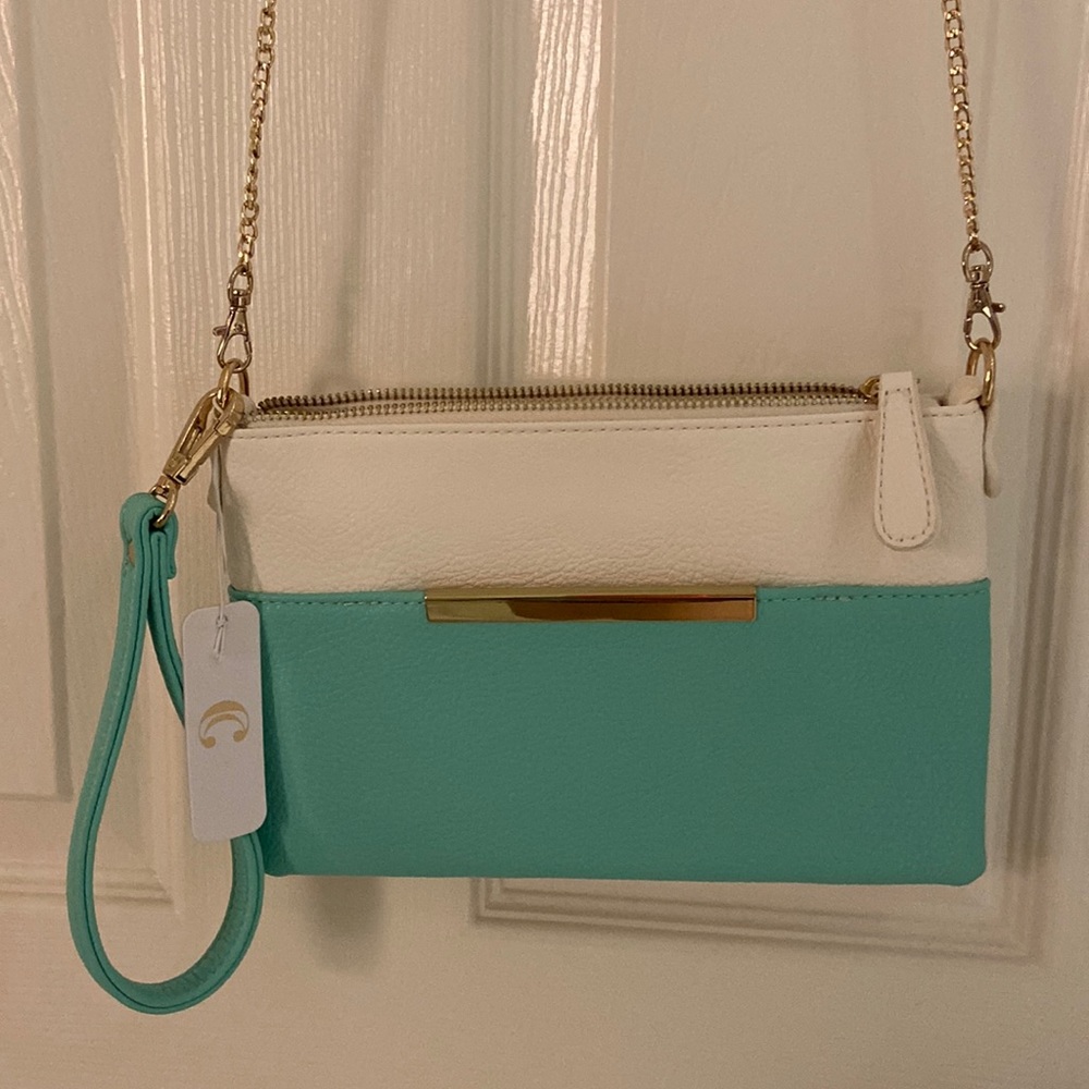 Charming Charlie clutch purse with detachable wrist strap and chain strap